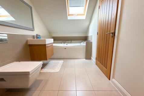 FAMILY BATH AND SHOWER ROOM
