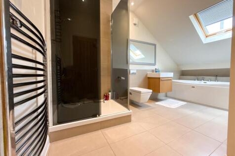 FAMILY BATH AND SHOWER ROOM