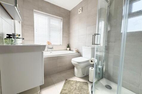 FAMILY BATH AND SHOWER ROOM