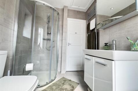 FAMILY BATH AND SHOWER ROOM