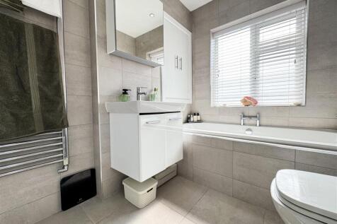 FAMILY BATH AND SHOWER ROOM