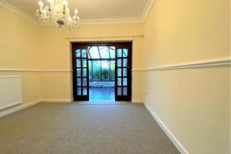 Dining room through to conservatory
