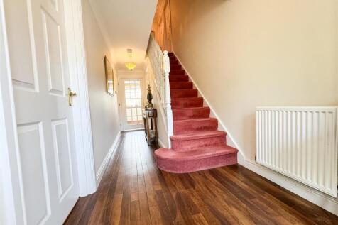 STAIRS RISING TO THE FIRST FLOOR
