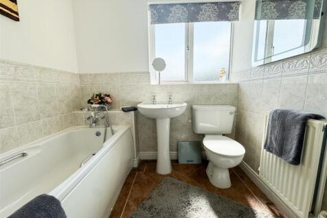 FAMILY BATH AND SHOWER ROOM