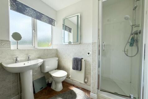 FAMILY BATH AND SHOWER ROOM