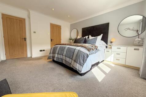 PRIMARY BEDROOM ONE