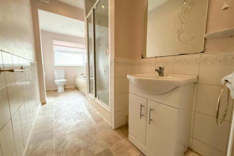 FAMILY BATH AND SHOWER ROOM