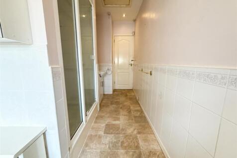 FAMILY BATH AND SHOWER ROOM