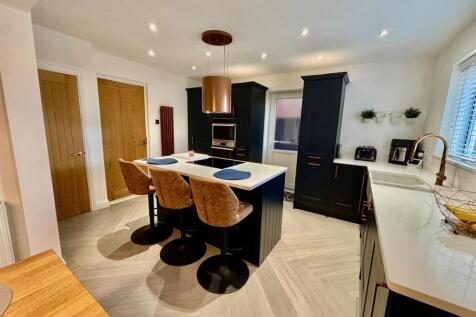 Dining Kitchen with Family Media Area