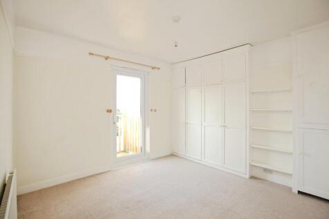 Bedroom With Balcony