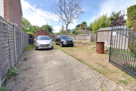 REAR PARKING/DRIVEWAY