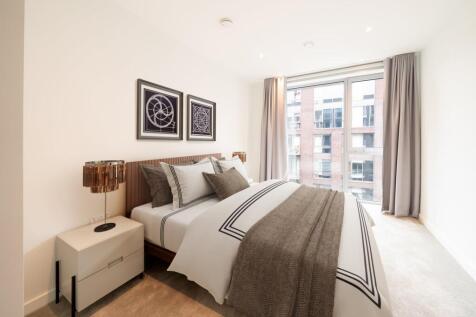 Experience tranquility and style in this chic bedroom haven.