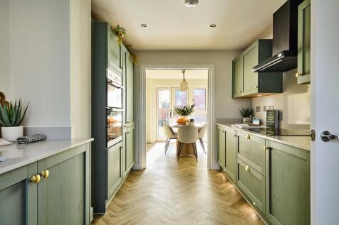 The open plan kitchen/dining area is perfect for socaiable family mealtimes