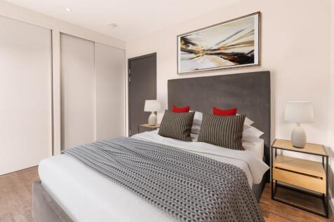 Experience comfort and style in this beautifully designed modern bedroom.