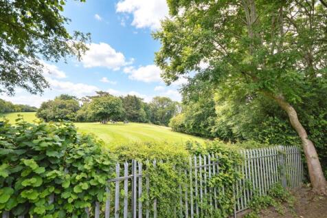 This neutrally decorated two-bedroom end of terrace house is **for sale** in a sought-after residential area of Bristol, backing directly onto a golf course and close to local woods and a nature reser