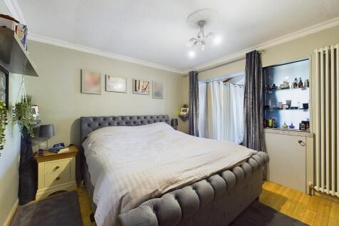 Master bedroom with dressing area and en-suite shower/wc