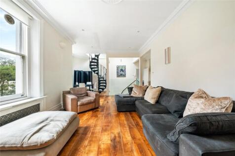 A fantastic three bedroom, two bathroom apartment set on the top floor of an impressive double fronted building on Linden Gardens.