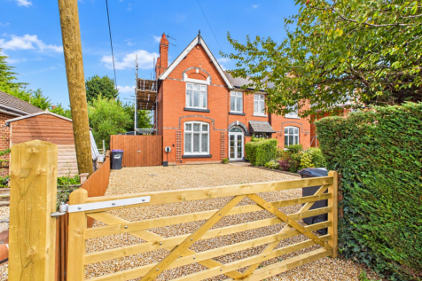 Victorian Brick House and Gravel Driveway.png