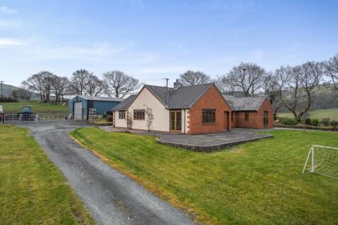 View of property with building.jpg