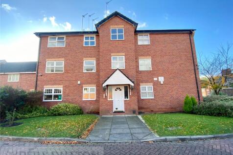 A smartly presented two bedroom first floor apartment located within this small modern apartment block on the Blackley/Crumpsall border. Boasting of secure entry phone system, well-tended communal gar