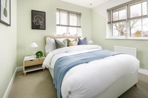 Bedroom 2 is an ideal guest bedroom, with space for a double bed