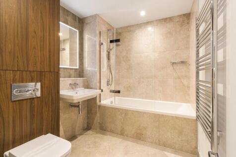 Experience elegance in this beautifully designed bathroom, featuring high-end finishes.