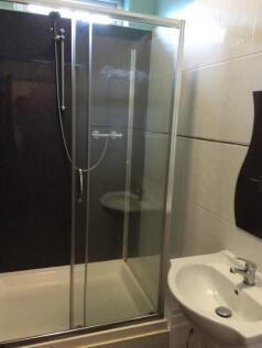 A modern bathroom featuring a clean and stylish...