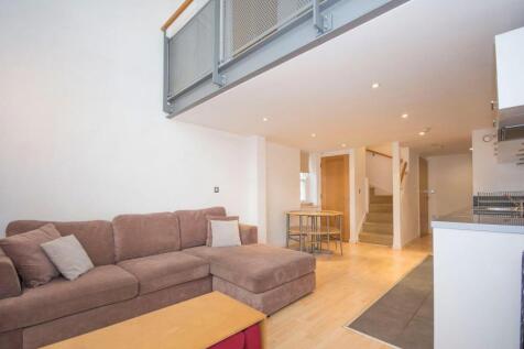 Modern one double bedroomed mezzanine apartment in private gated development situated in recent school conversion.