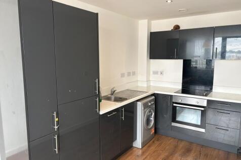 Furnished two bedroom, two bathroom apartment on the 12th floor of Silkhouse Court, Liverpool L2. Modern office conversion with open-plan living, en-suite principal bedroom and an excellent city-centr