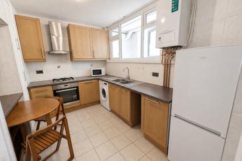 Bright and spacious HMO-licensed three double bedroom split-level maisonette with private balcony, ideally located moments from Swiss Cottage and St John's Wood stations.