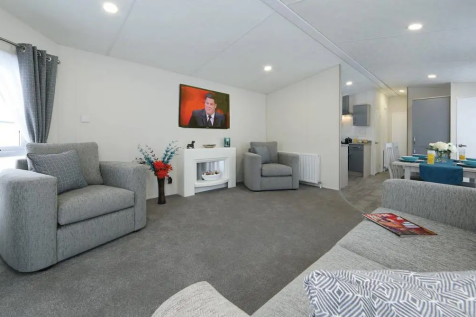Bright Open Plan Lounge With Modern Grey Seating A