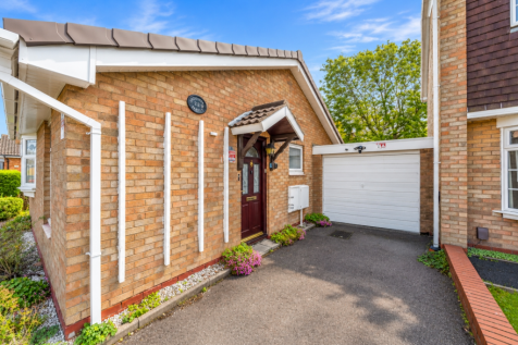Suburban Brick Home Entrance and Garage