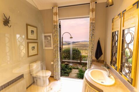 Bathroom with outside shower too !