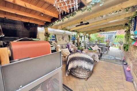 Covered outdoor living area view 2