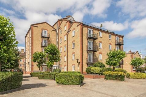 A two bedroom, two bathroom property with a modern kitchen which is separate from the living space. Set on the second floor of a secure purpose-built development, the property has a balcony, parking s