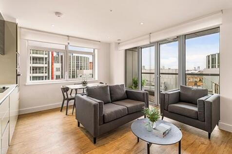 Experience urban living at its finest in this stylish and comfortable living room.