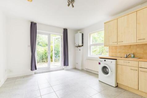 ZERO DEPOSIT AVAILABLE. LONG LET. Ideally located on an attractive street in Muswell Hill, this superb three bedroom flat offers a bright reception room with open-plan kitchen opening onto patio.