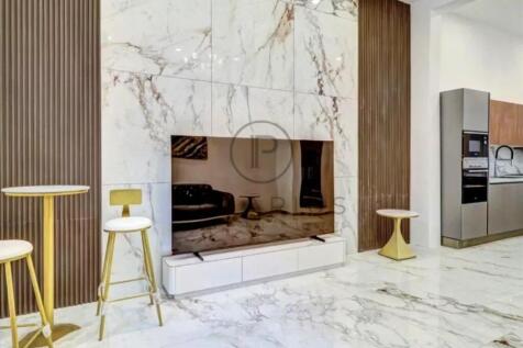 Elegant living room with a modern marble fireplace