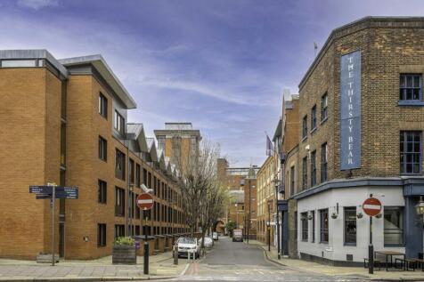 Split level two bedroom two bathroom apartment in a secure block. Features two private balconies, wooden flooring throughout the open plan living space.
