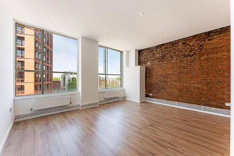 Located in Haggerston sits this spacious one bedroom apartment. High ceilings give the apartment a very open feel and large windows keep the rooms bright. The bedroom is a great size, the bathroom is