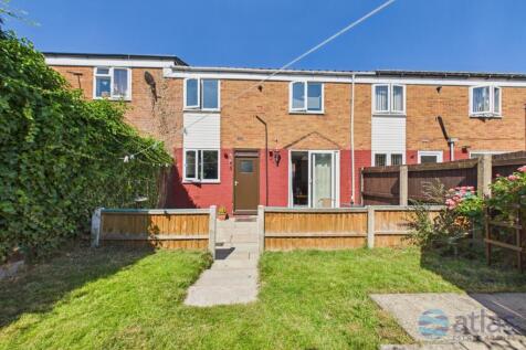 A stylish three-bedroom home offering a modern fitted kitchen, bright reception room opening to the garden, generous bathroom, downstairs WC, spacious porch ideal as a home office, private driveway, l