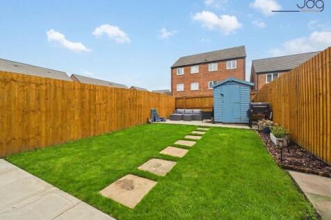 Landscaped and enclosed rear garden