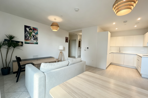 A modern one-bedroom apartment at Hendon Waterside, offering a private external balcony, landscaped communal surroundings and convenient transport connections.
