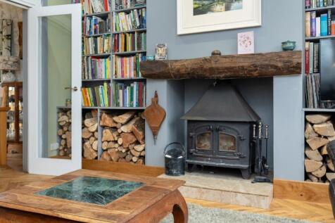 A character-filled lounge with original windows, v