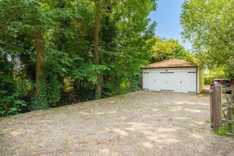 Double Garage With Gated Driveway