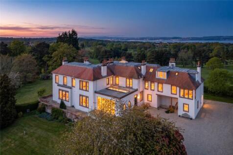 One of Edinburgh's finest homes, with superb family accommodation over three floors, set in wonderfully mature garden grounds of over 1.55 acres