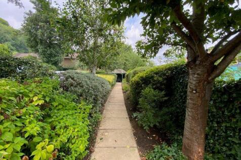 PATH TO PERGOLA FROM THE PROPERTY