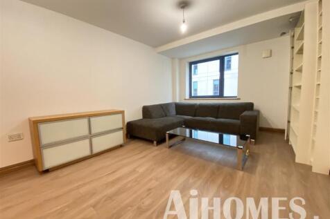 Nestled in the vibrant heart of Manchester, this charming two-bedroom house offers a perfect blend of modern living and convenience. Spanning 657 square feet, the property was built in 2002 and featur