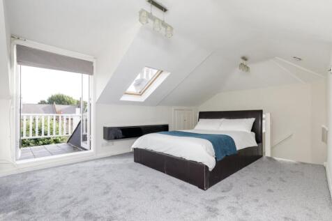 A beautifully presented three-bedroom, two-bathroom home offering ample living space, ideally located on Salford Road, SW2.