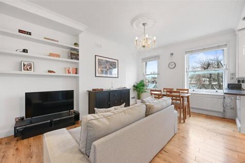 A smart two double bedroom flat on the second floor of a converted Victorian house in Brook Green. Part Furnished. Available 1st August .